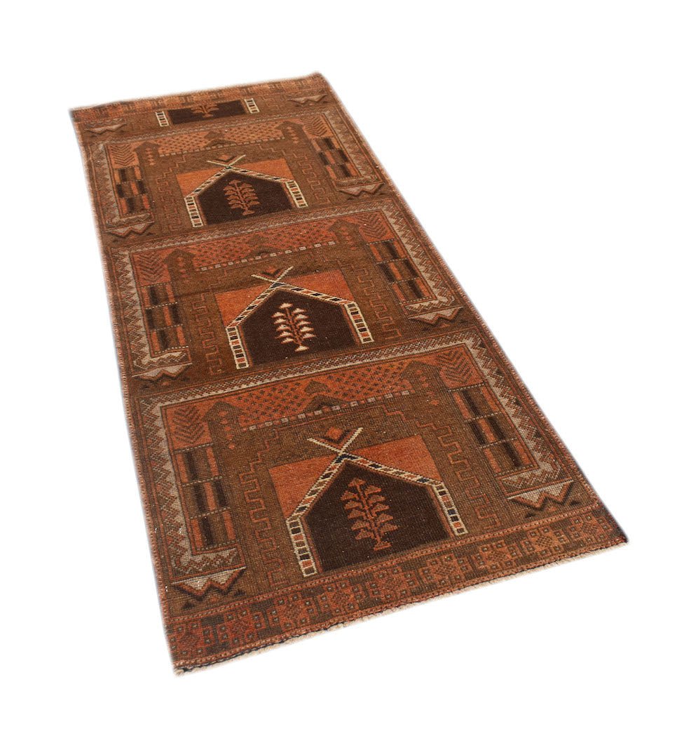 A handmade Afghan Baluch runner rug featuring three repeating geometric arch motifs in brown and rust.
