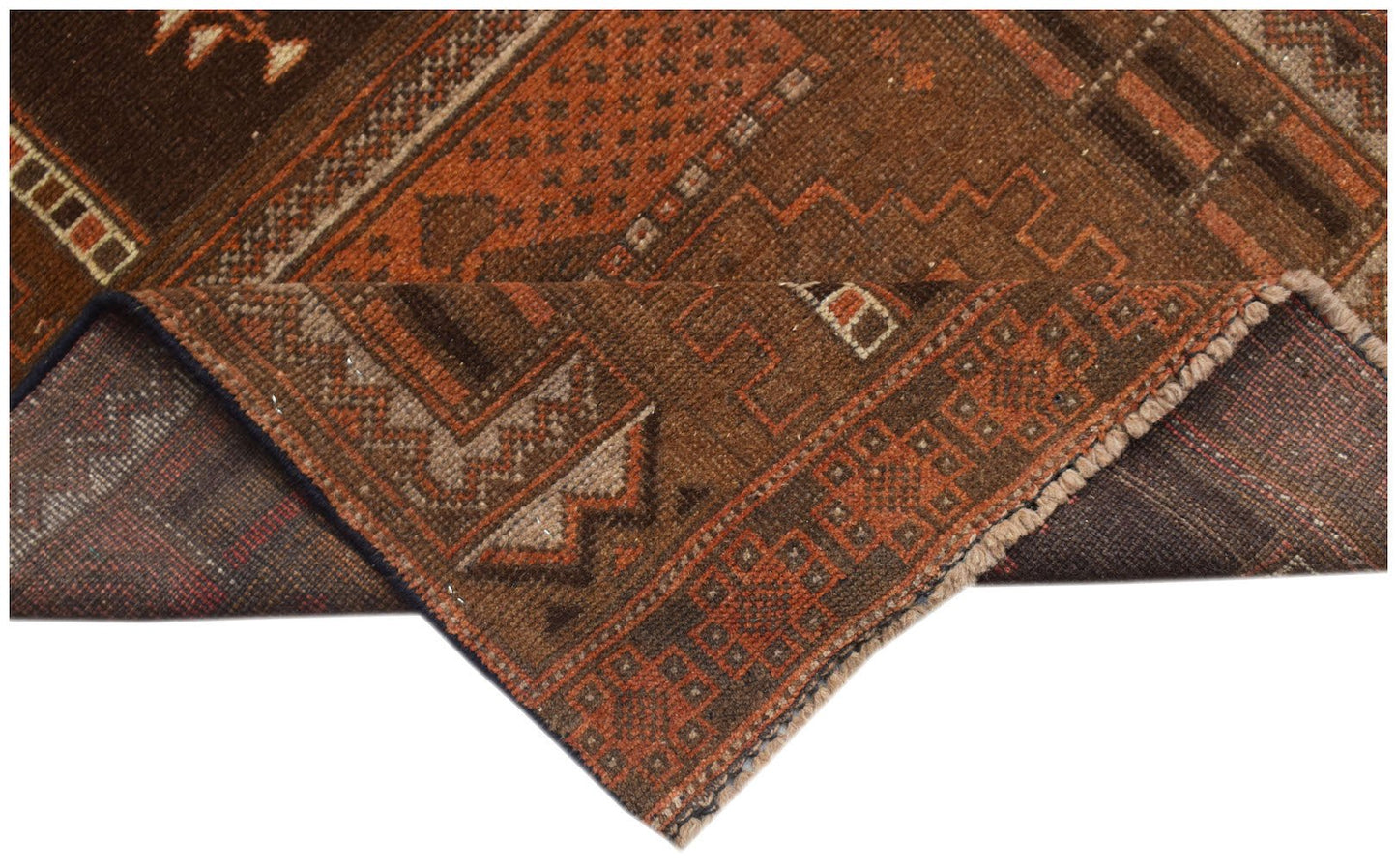 A handmade Afghan Baluch rug featuring geometric patterns in shades of brown and burnt orange.