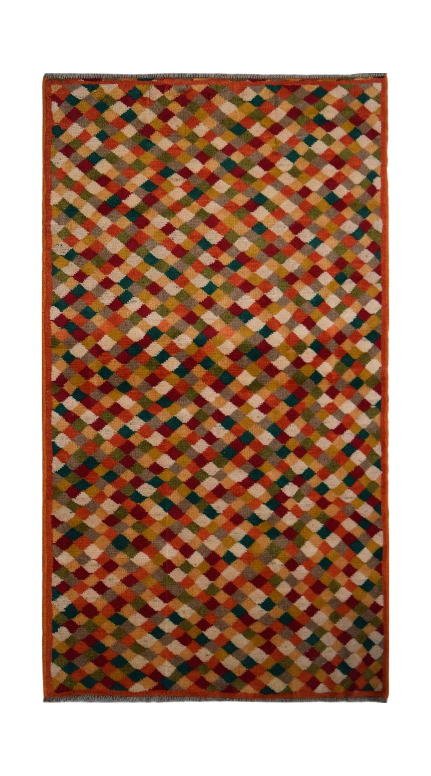 Handmade Afghan Baluch rug featuring a colorful diamond pattern in wool.
