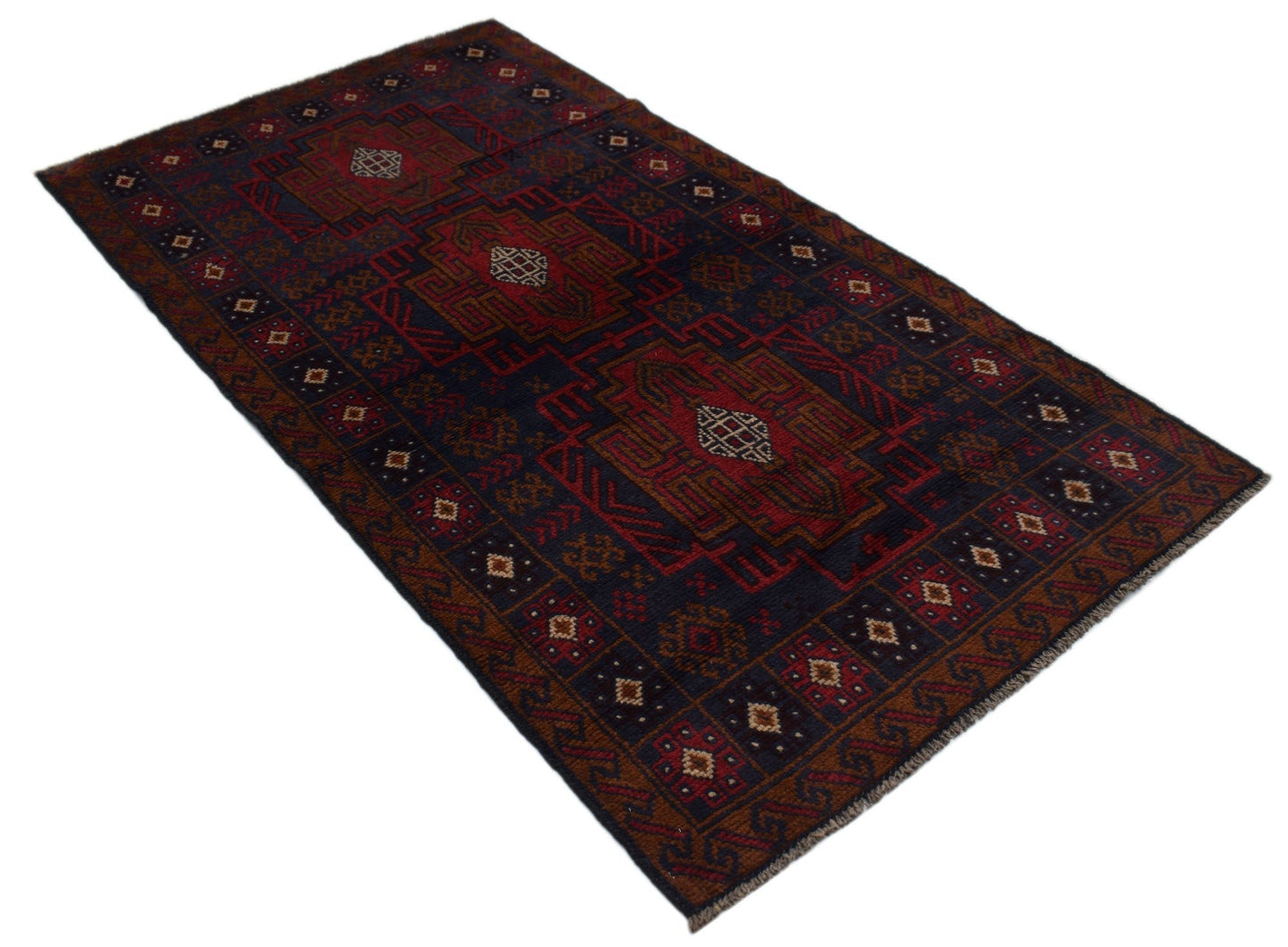 Handmade Afghan Baluch rug featuring traditional geometric patterns in dark red, blue, and brown.
