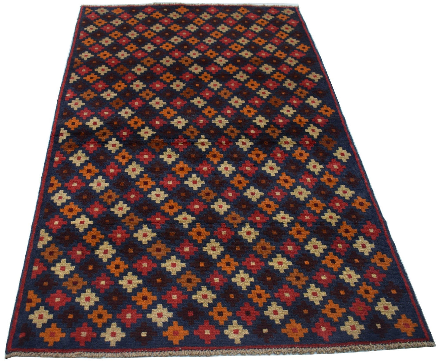 Handmade Afghan Baluch rug featuring a repeating geometric floral pattern in red, brown, and blue.