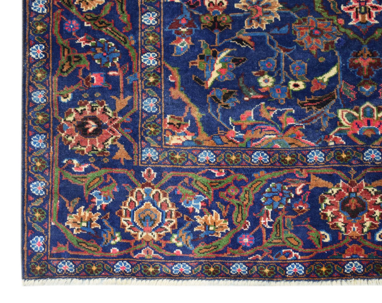 A vintage Afghan Baluch rug featuring intricate floral patterns in blue, red, and ivory tones.