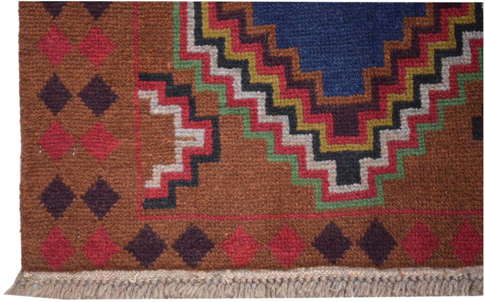 Handmade Afghan Pashm rug featuring a geometric pattern in brown, blue, red, and green wool.