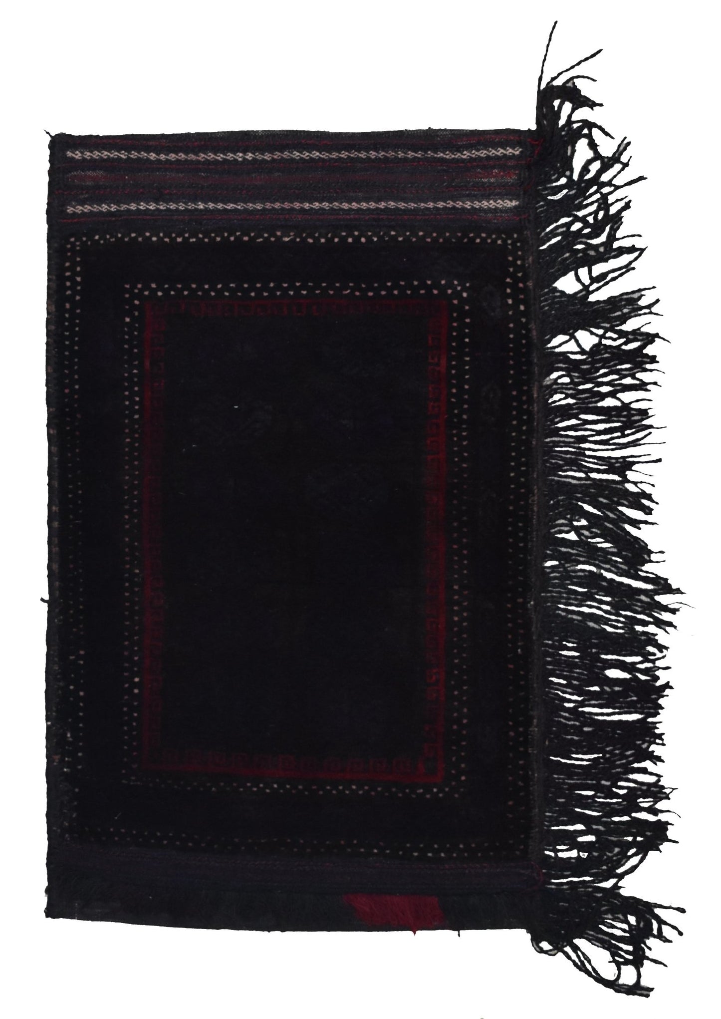 A vintage handmade Afghan Baluch wool cushion featuring a dark geometric pattern and fringe.