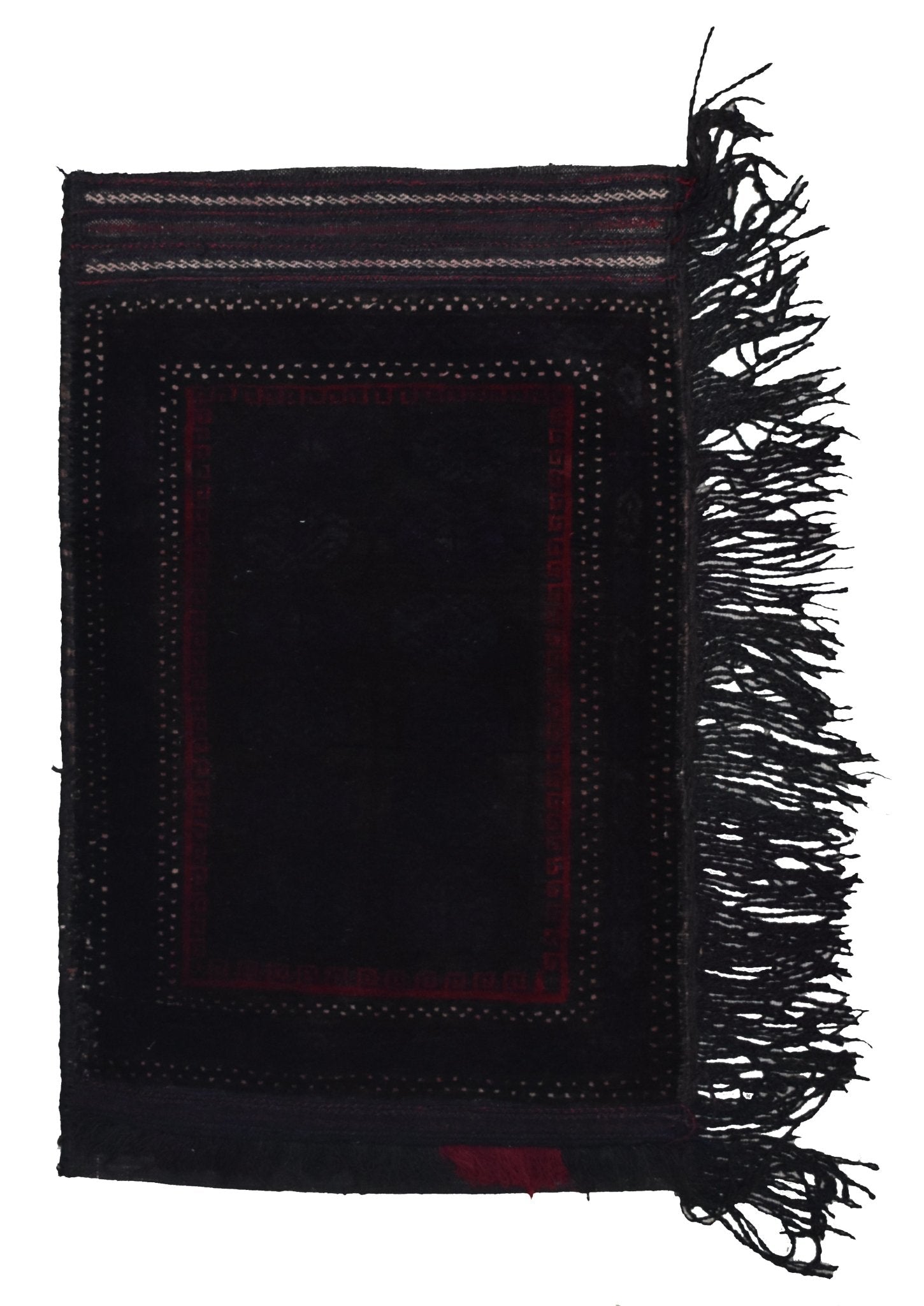 A vintage handmade Afghan Baluch wool cushion featuring a dark geometric pattern and fringe.
