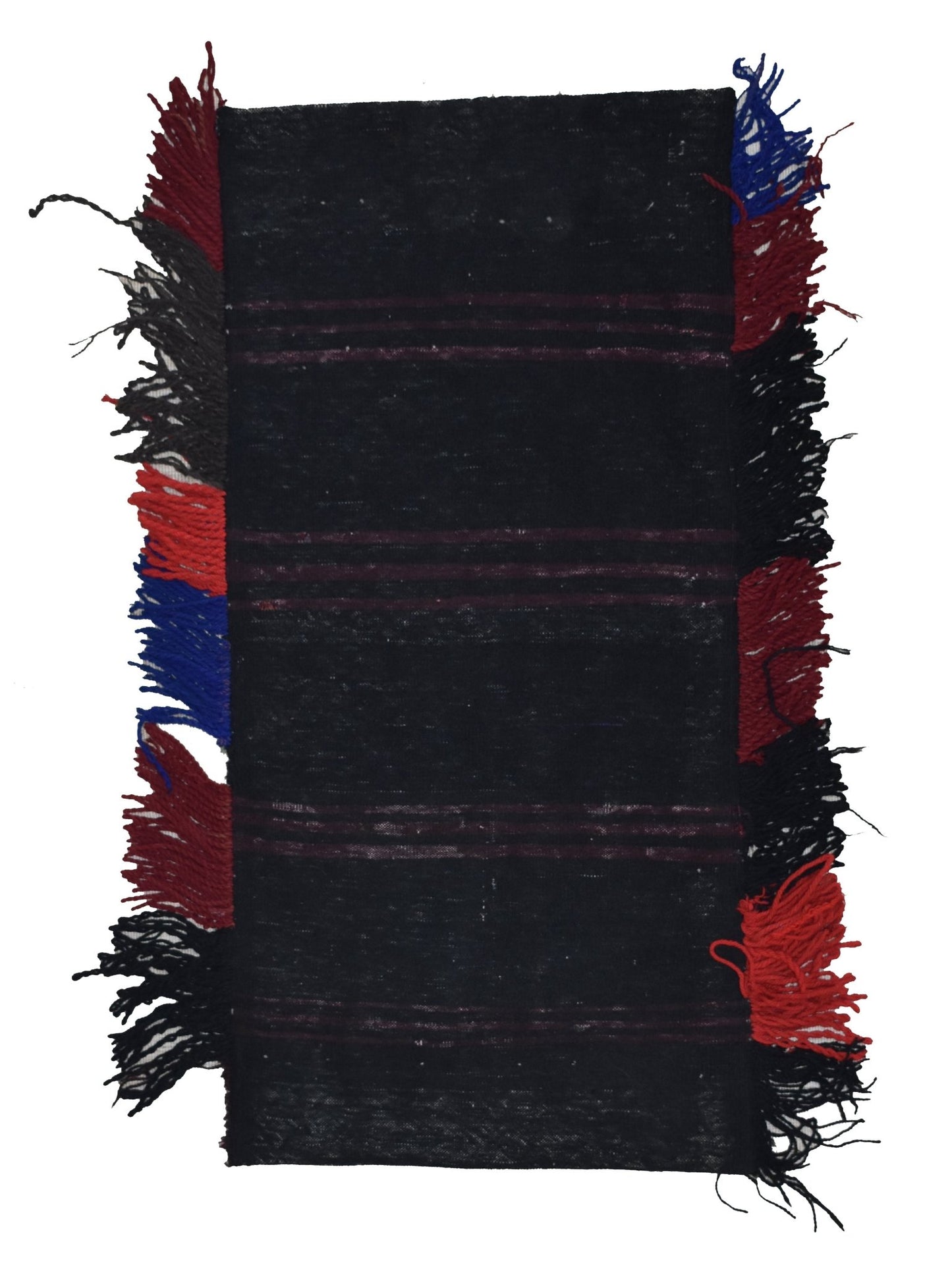 A rectangular vintage Afghan Baluch wool cushion with black fabric and colorful fringed edges.