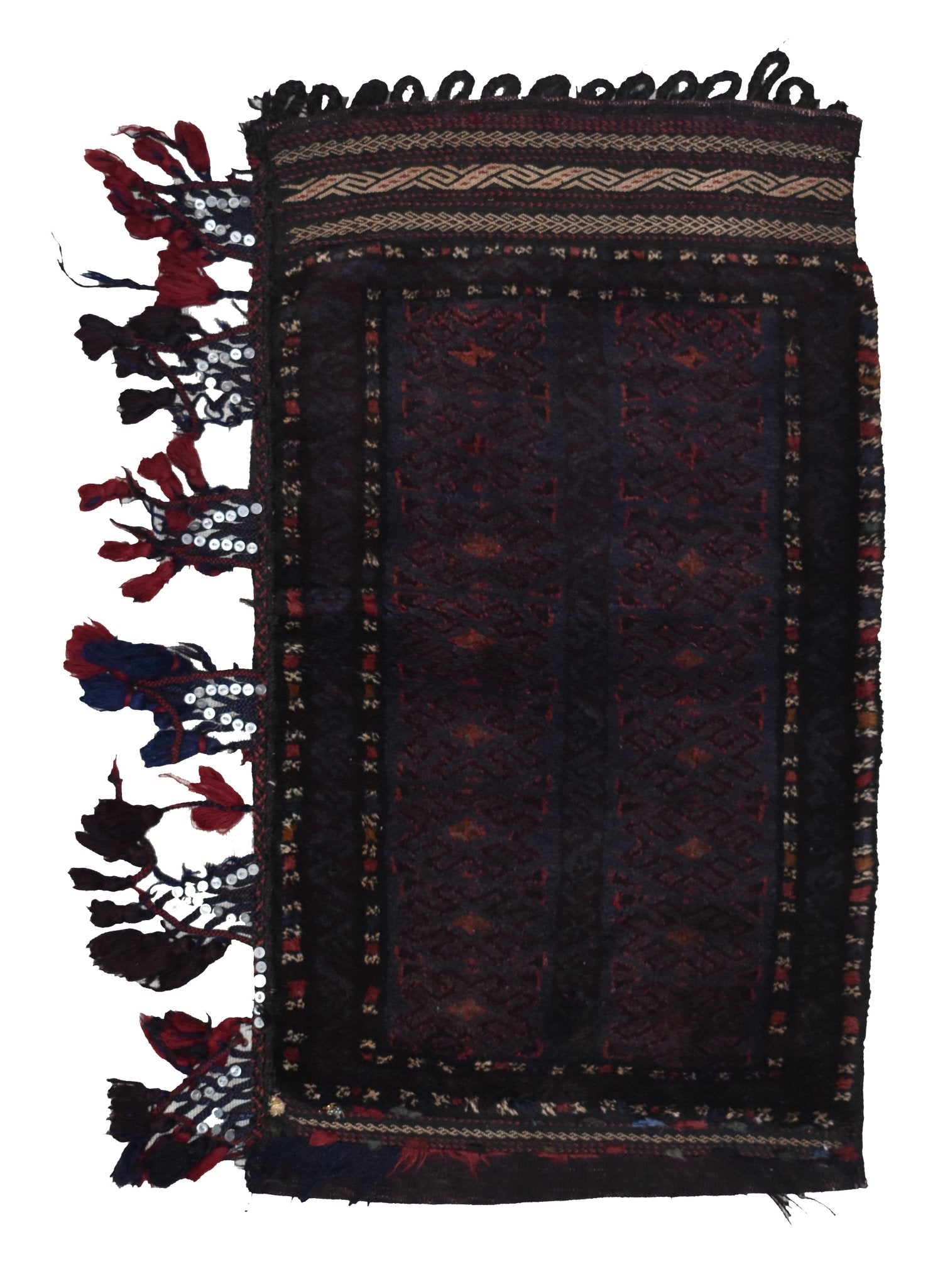 A vintage handmade Afghan Baluch wool cushion featuring dark geometric patterns and side tassels.