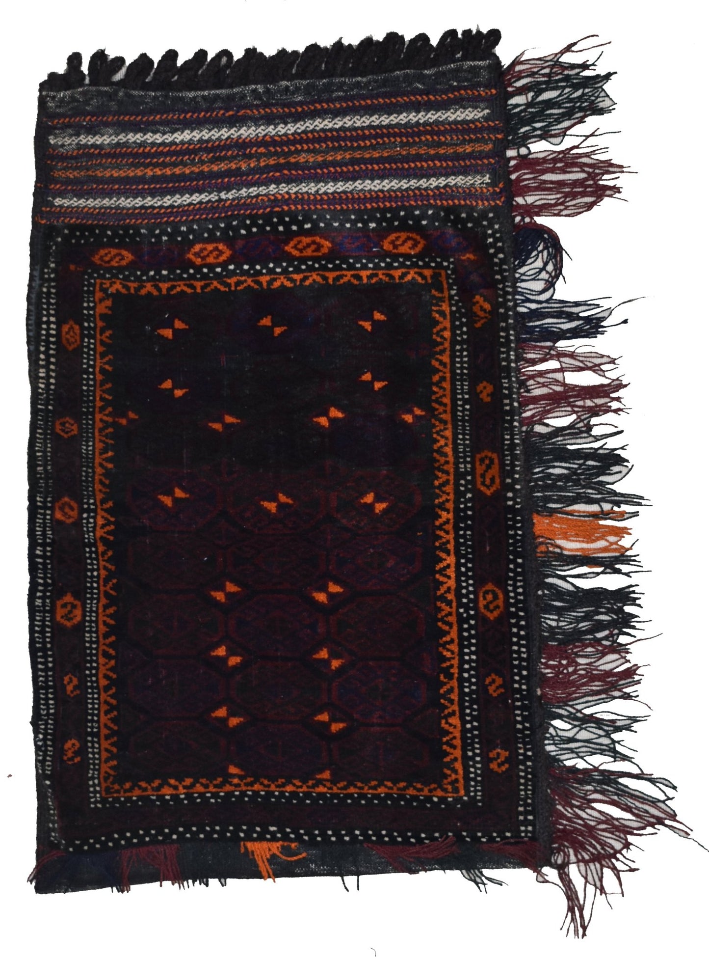 A handmade vintage Afghan Baluch wool cushion featuring a dark geometric pattern and fringe.