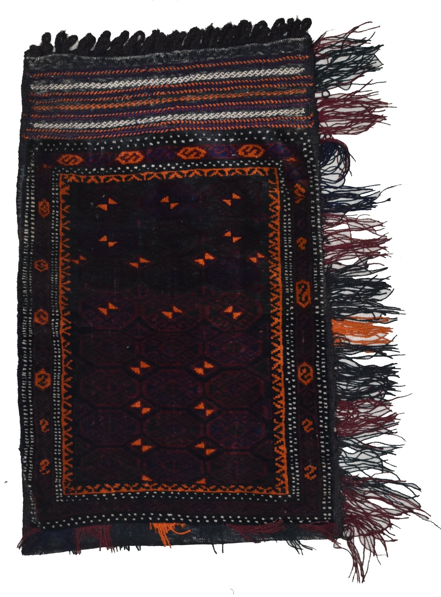 A handmade vintage Afghan Baluch wool cushion featuring a dark geometric pattern and fringe.