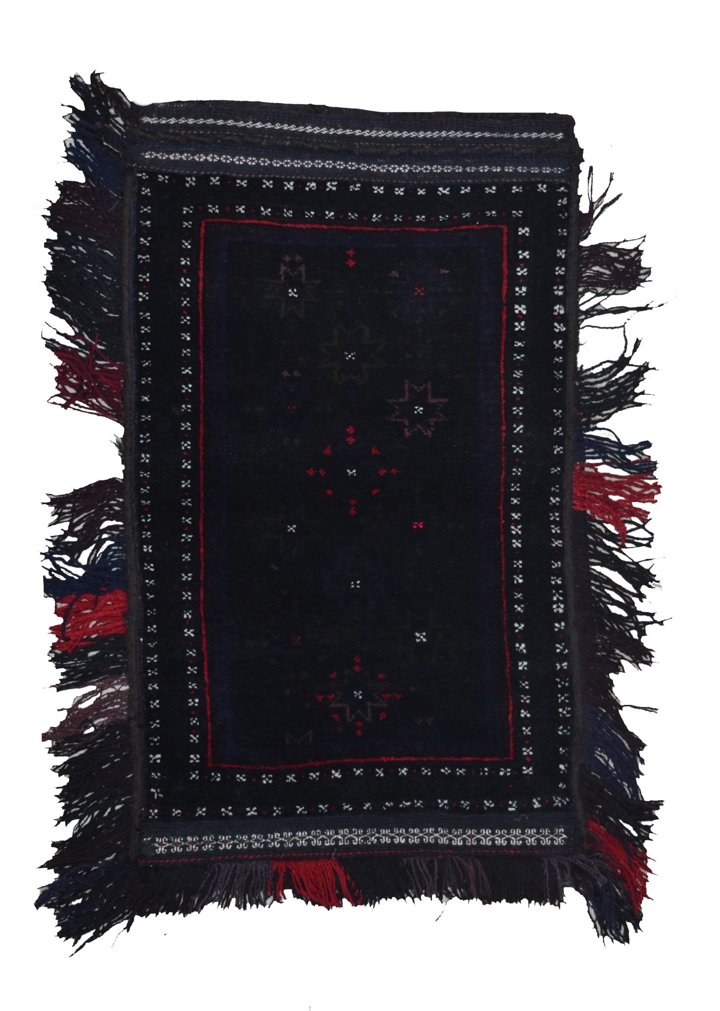A handmade vintage Afghan Baluch wool cushion featuring a dark field with geometric star motifs.