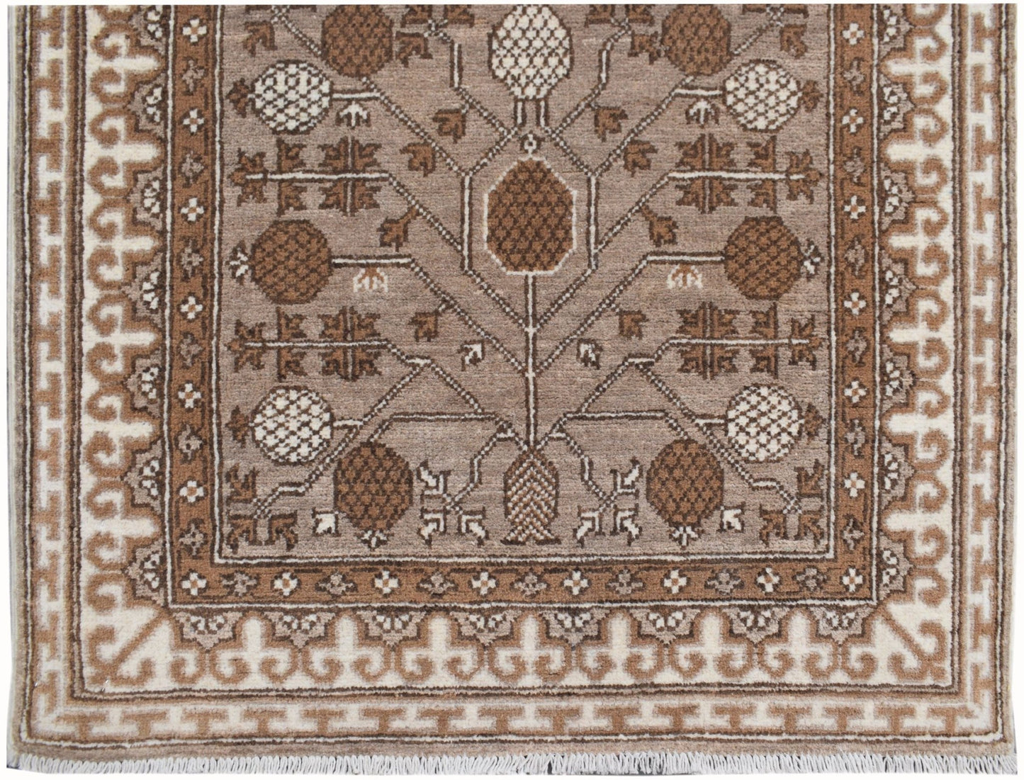 A handmade Afghan Chobi runner featuring a brown and cream geometric tree of life pattern.