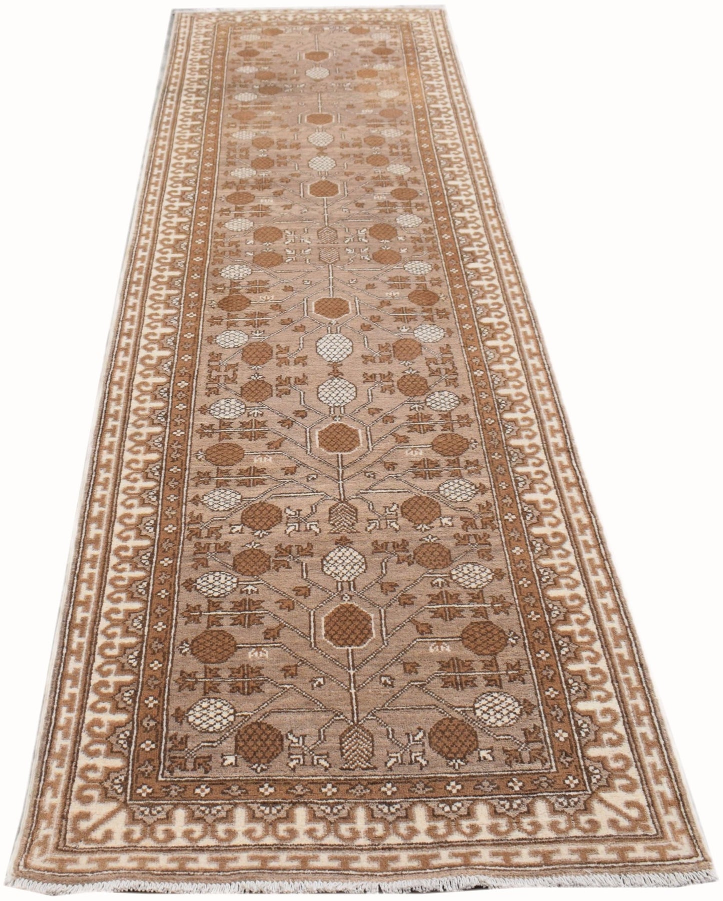 A handmade Afghan Chobi runner rug featuring a traditional Khotan pattern in natural wool tones.