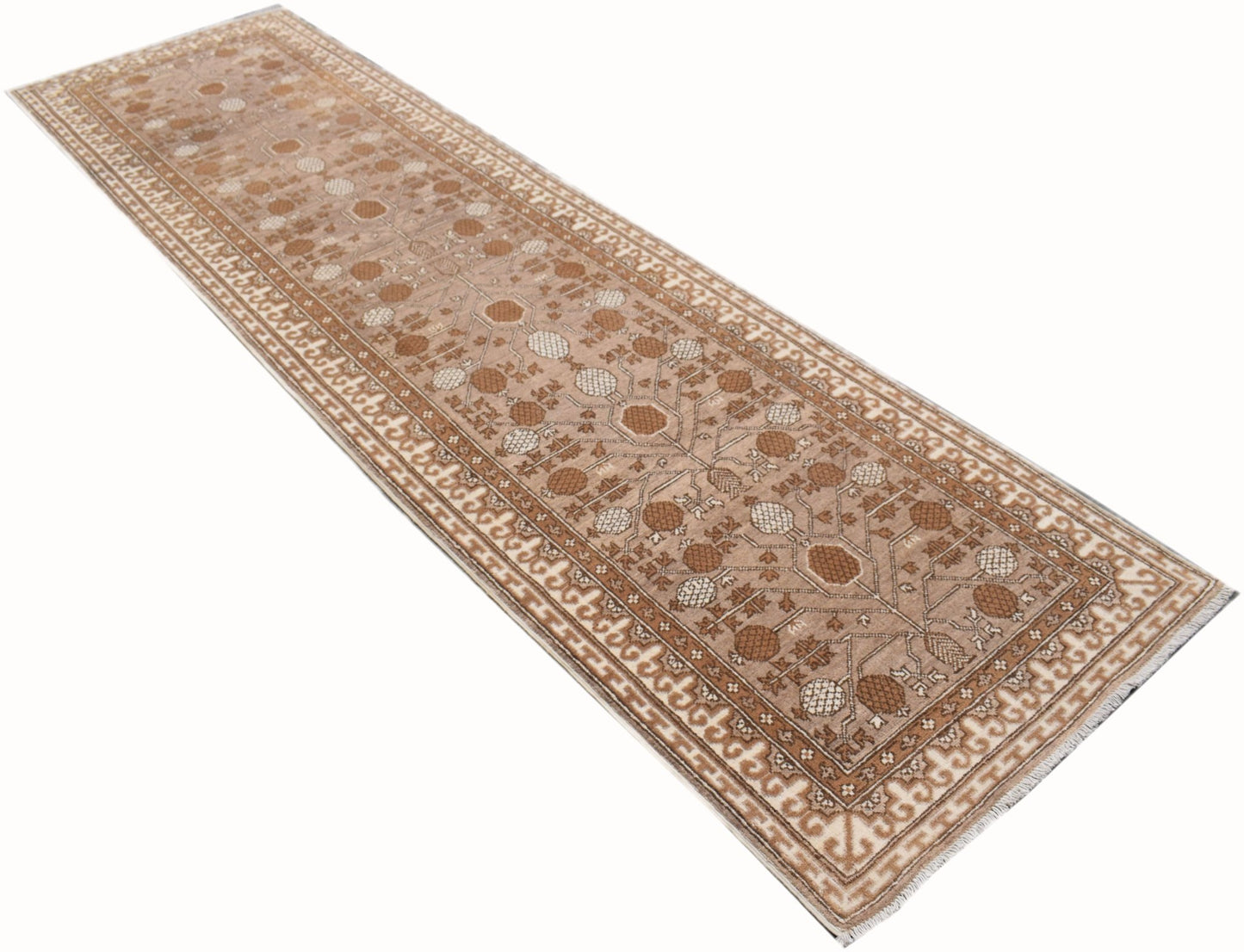 A handmade Afghan Chobi runner rug featuring a traditional Khotan pattern in shades of brown.