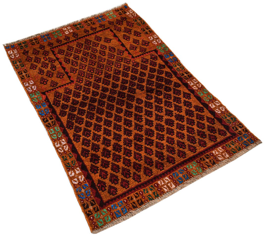 A handmade Afghan Pashm rug featuring a repeating diamond pattern in dark red and brown tones.