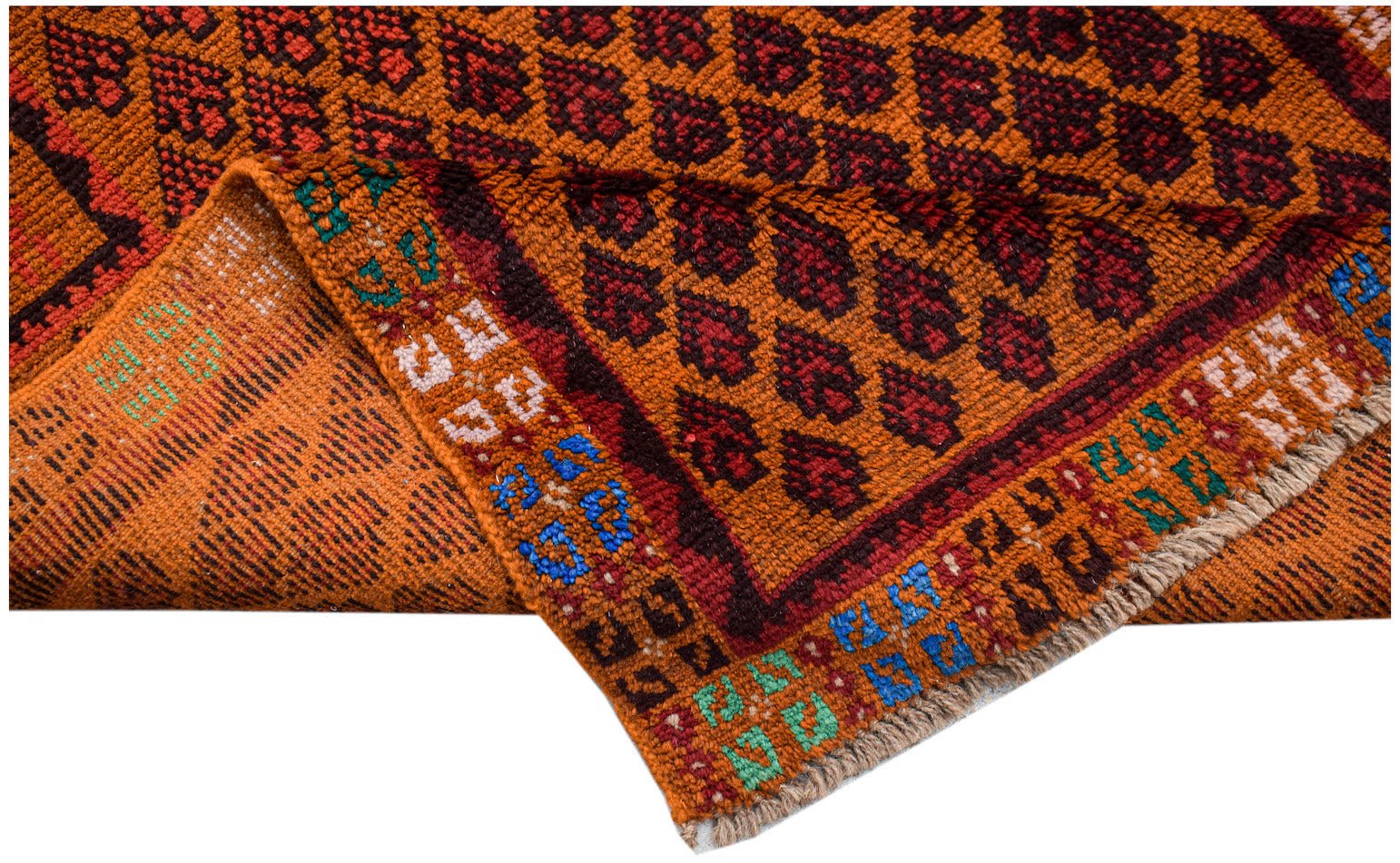 A handmade Afghan Pashm rug featuring a repeating dark red leaf pattern on an orange background.