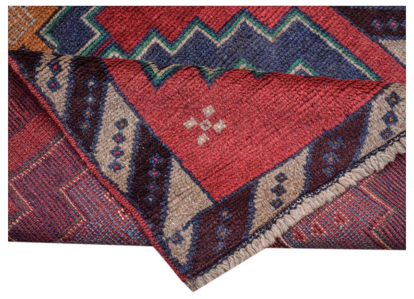 A handmade Afghan Pashm rug featuring a geometric tribal pattern in red, blue, and brown wool.