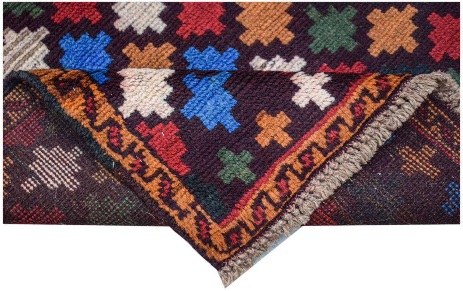 A handmade Afghan Pashm rug featuring a dark brown field with colorful geometric motifs.