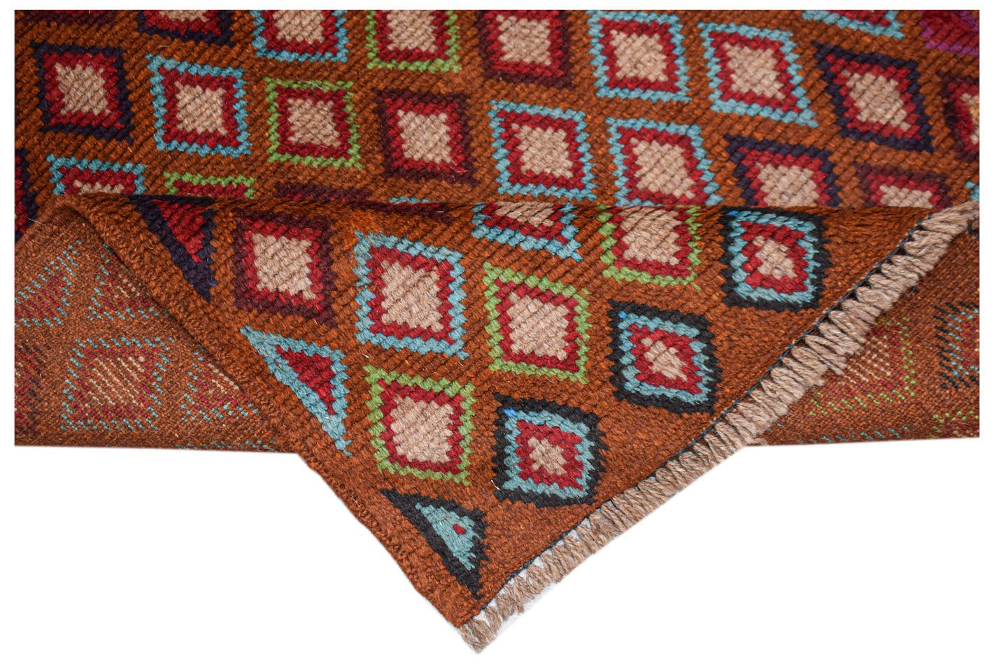 A handmade Afghan Pashm rug featuring a repeating geometric diamond pattern in brown, red, and blue.