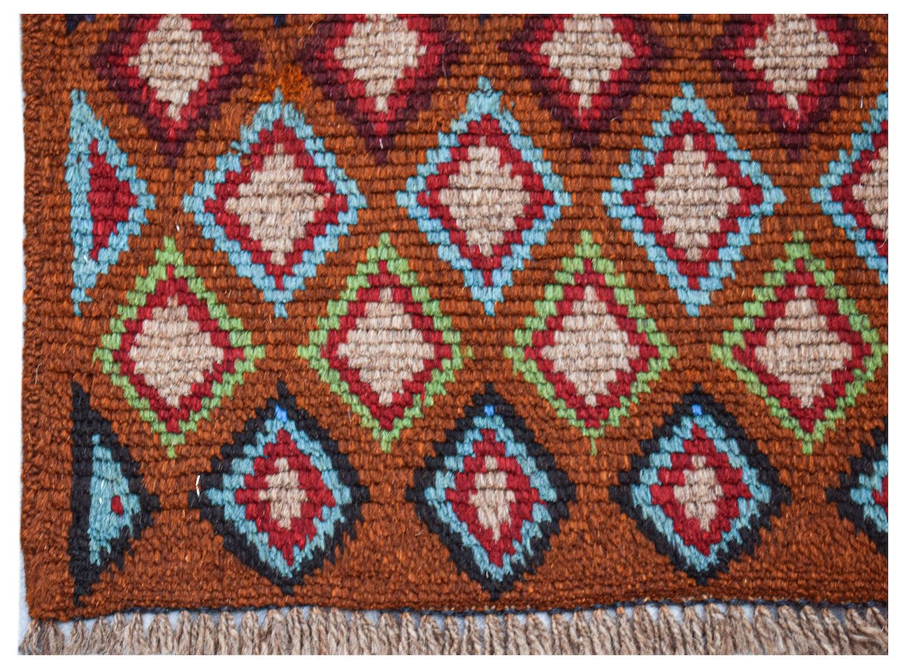 Handmade Afghan Pashm rug featuring a geometric diamond pattern in red, blue, and green on brown.