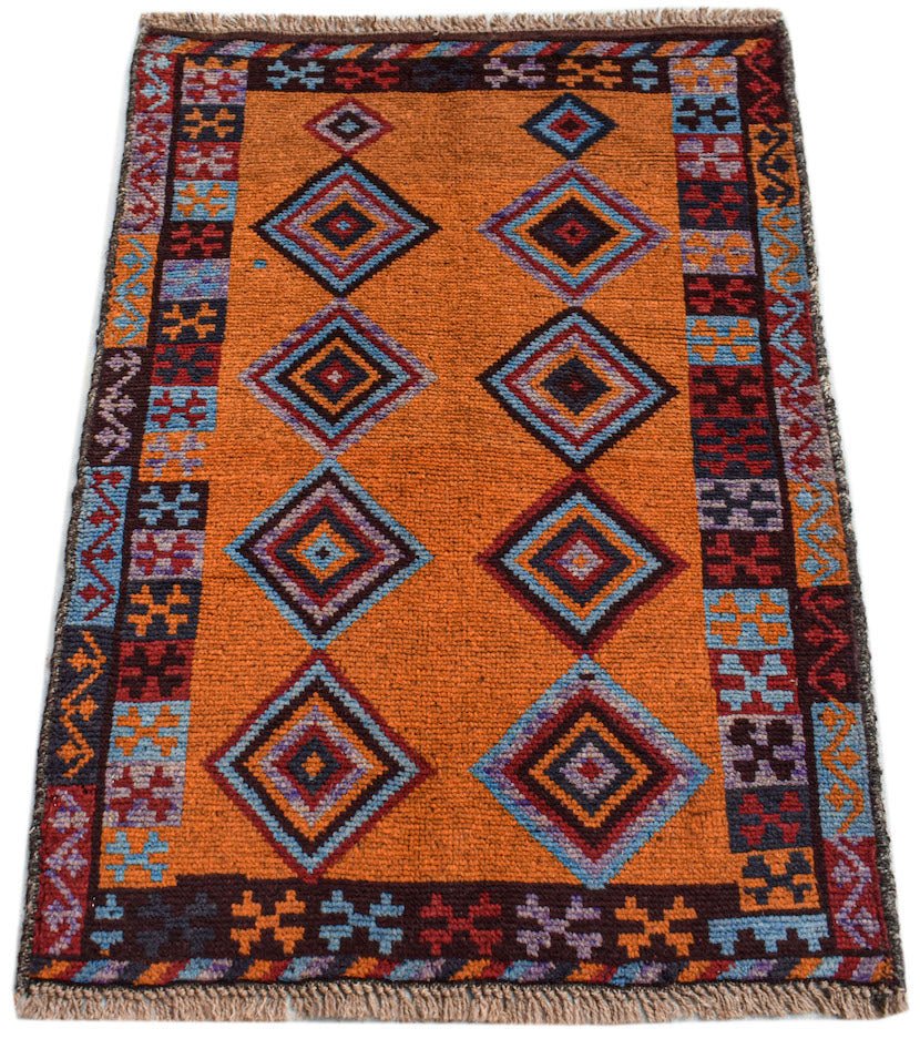 Handmade Afghan Pashm rug featuring a vibrant orange field with geometric diamond patterns.