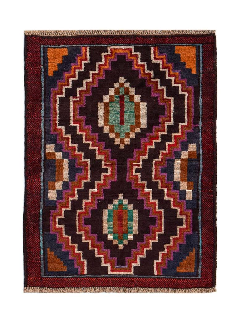 Handmade Afghan Pashm rug featuring a geometric tribal pattern in dark red, brown, and blue tones.
