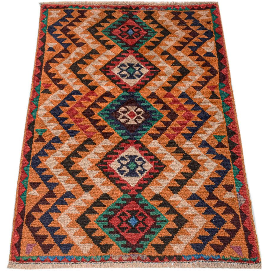 Afghan Pashm rug with a diamond pattern in orange, red, green, and blue.