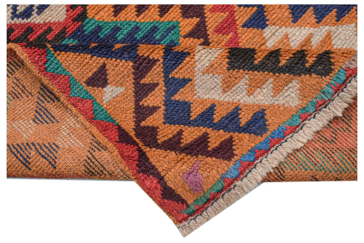 Afghan Pashm Rug with geometric patterns in orange, blue, red, and green.