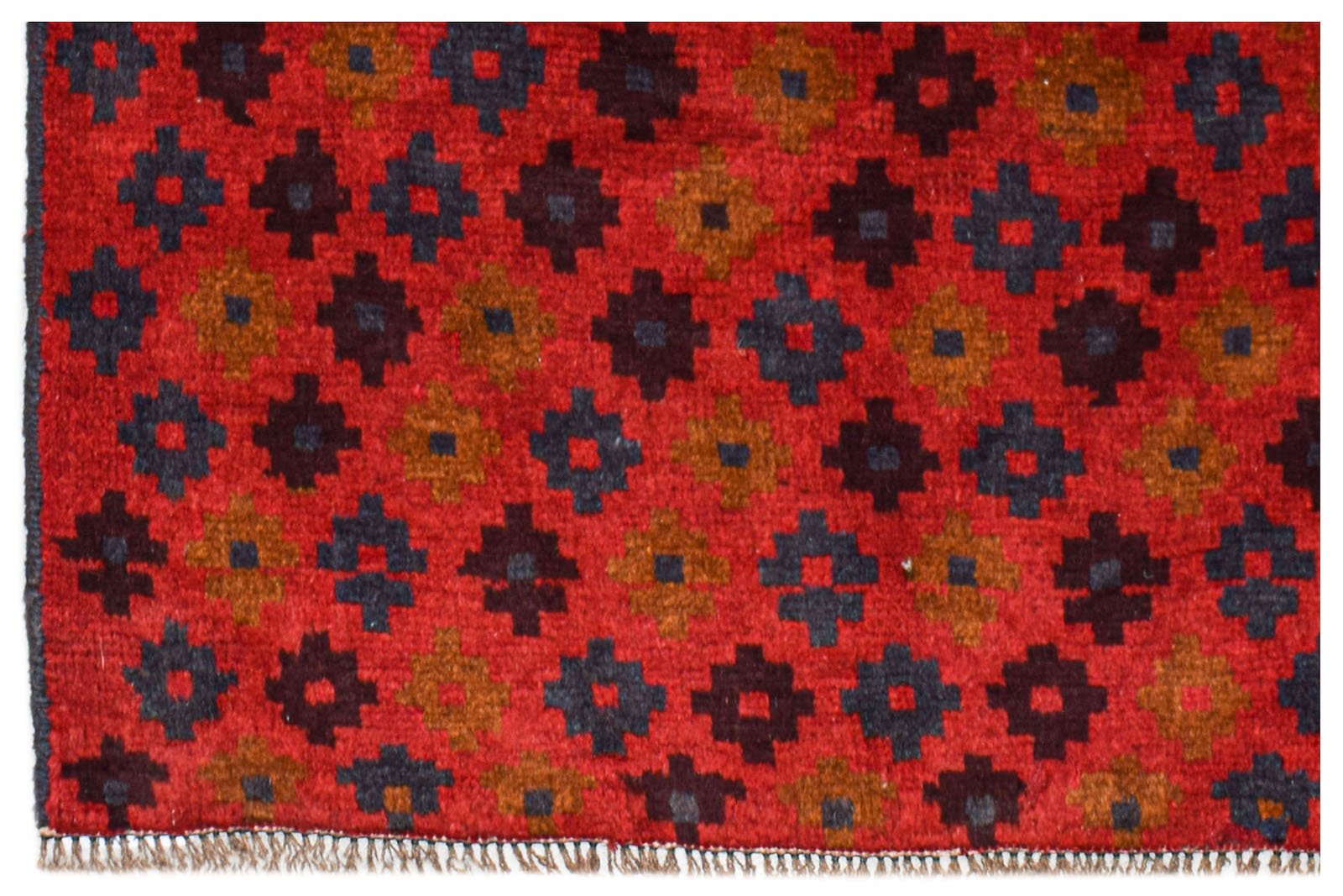 Handmade Afghan Pashm rug featuring a repeating geometric pattern in red, brown, and dark blue.