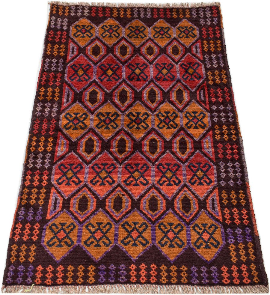 Handmade Afghan Pashm rug featuring a geometric diamond pattern in shades of red, orange, and brown.