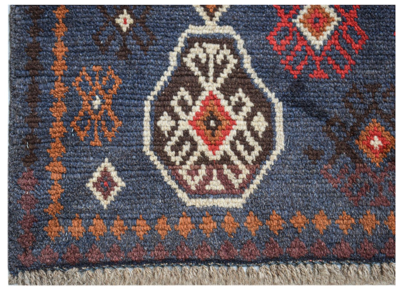 Afghan Pashm Rug with geometric patterns in blue, brown, and red.