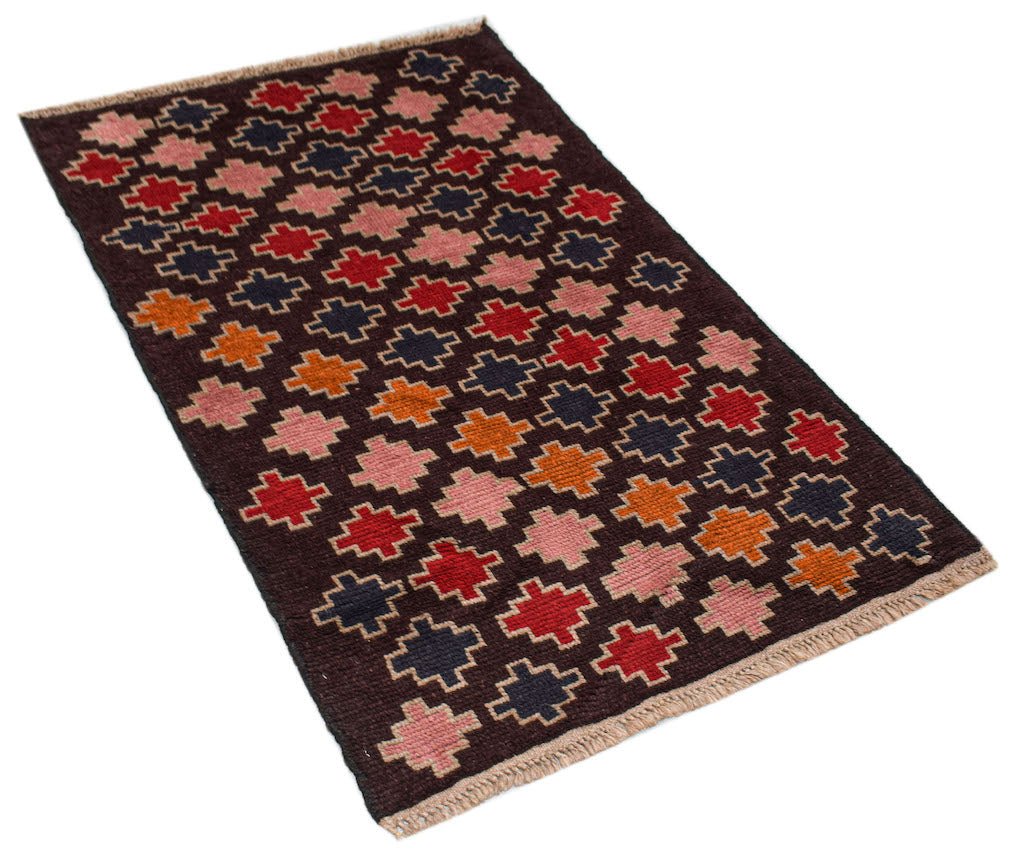 Handmade Afghan Pashm rug featuring a dark brown field with a repeating geometric cross pattern.