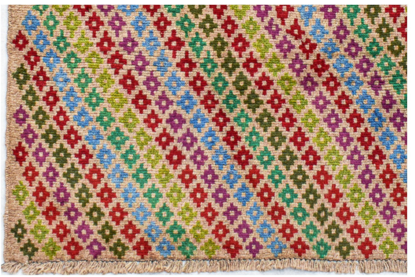 Handmade Afghan Pashm rug featuring a colorful geometric diamond pattern on a tan wool background.