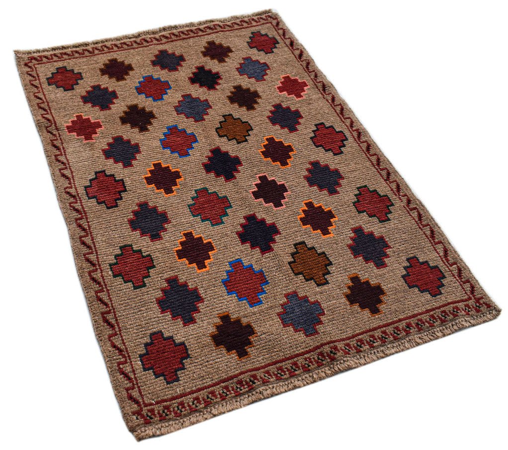 Handmade Afghan Pashm rug featuring a repeating geometric pattern in earthy tones on a tan field.