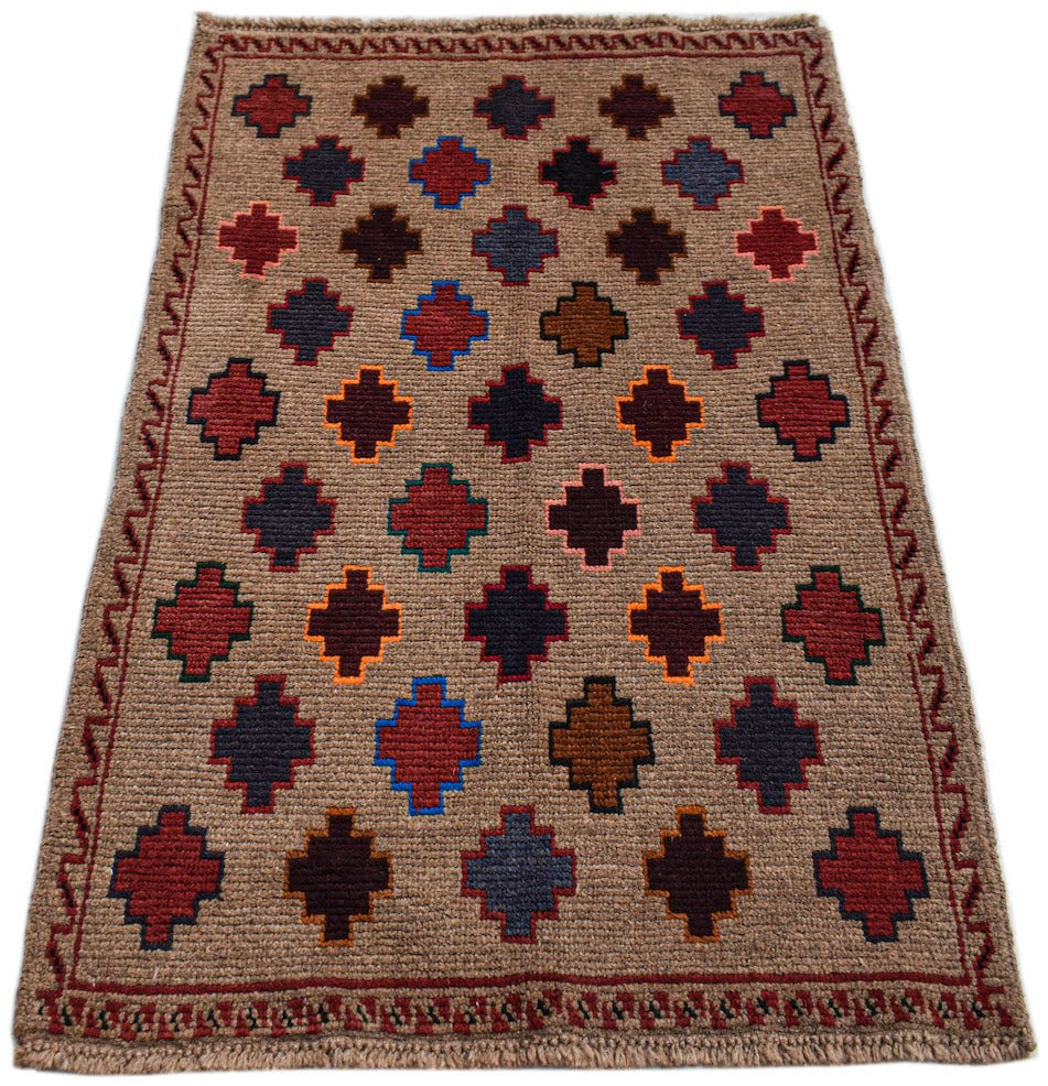 Handmade Afghan Pashm rug featuring a repeating geometric cross pattern in earthy tones.