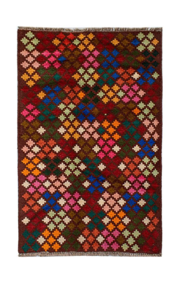 Handmade Afghan Pashm rug featuring a geometric pattern of colorful squares on a brown background.