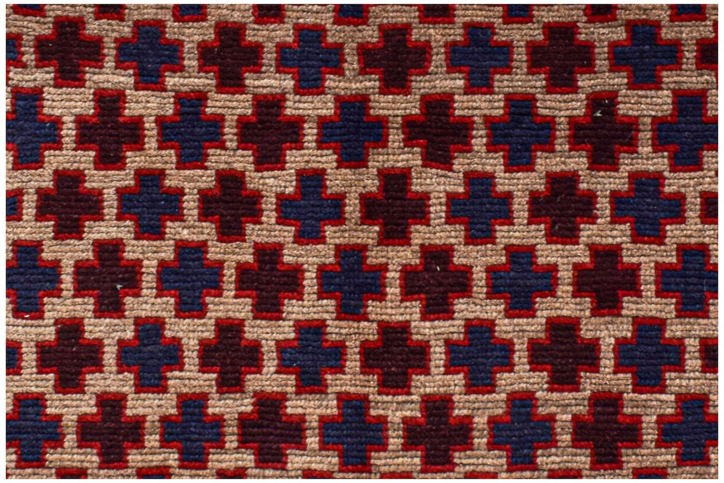 Handmade Afghan Pashm rug featuring a repeating geometric cross pattern in blue, red, and brown.