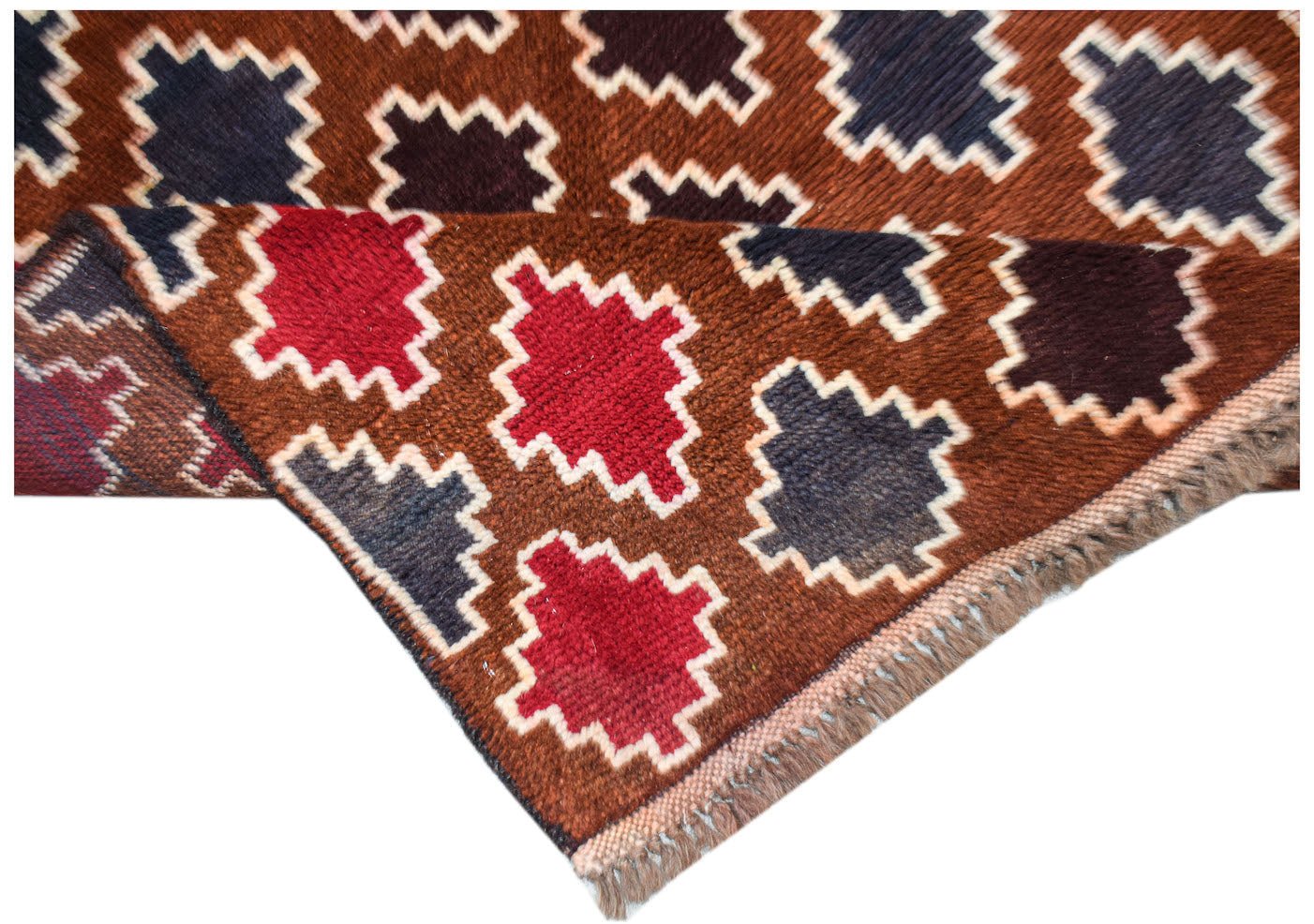 Handmade Afghan Pashm rug featuring a geometric pattern of red and blue shapes on a brown field.