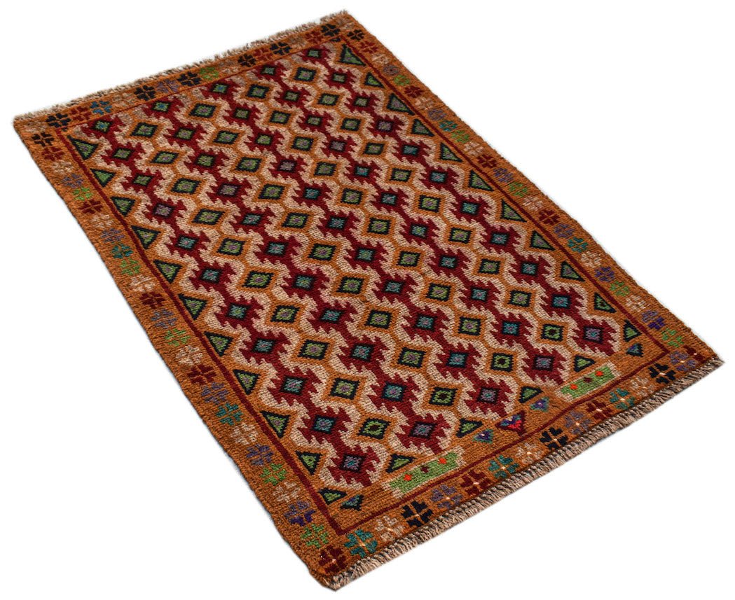 A handmade Afghan Pashm rug featuring a geometric pattern in shades of red, brown, and blue.