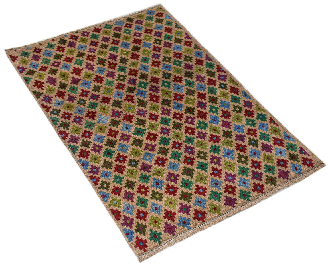 Handmade Afghan Pashm rug featuring a repeating geometric floral pattern in red, blue, and green.