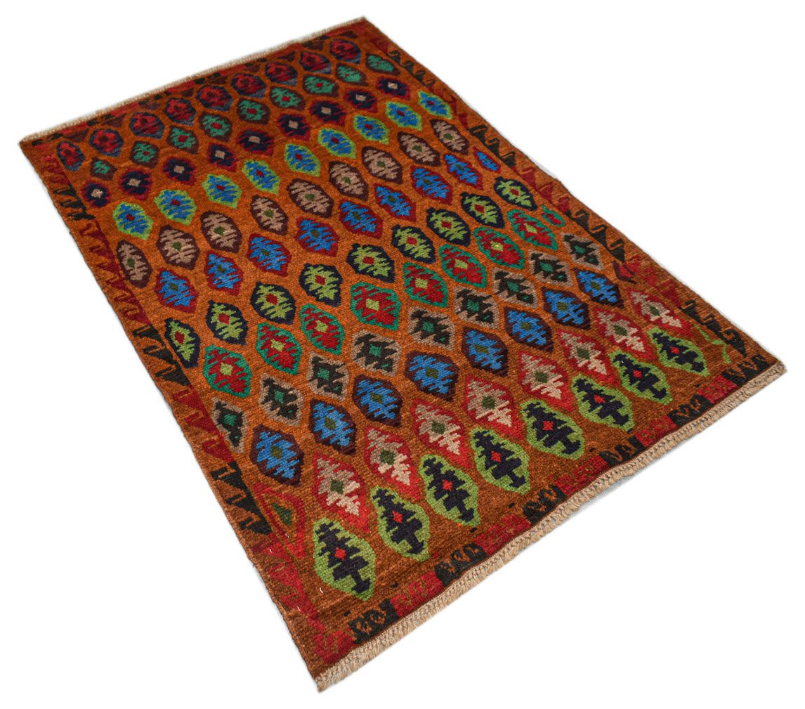 Handmade Afghan Pashm rug featuring a repeating diamond pattern in red, blue, and green on brown.