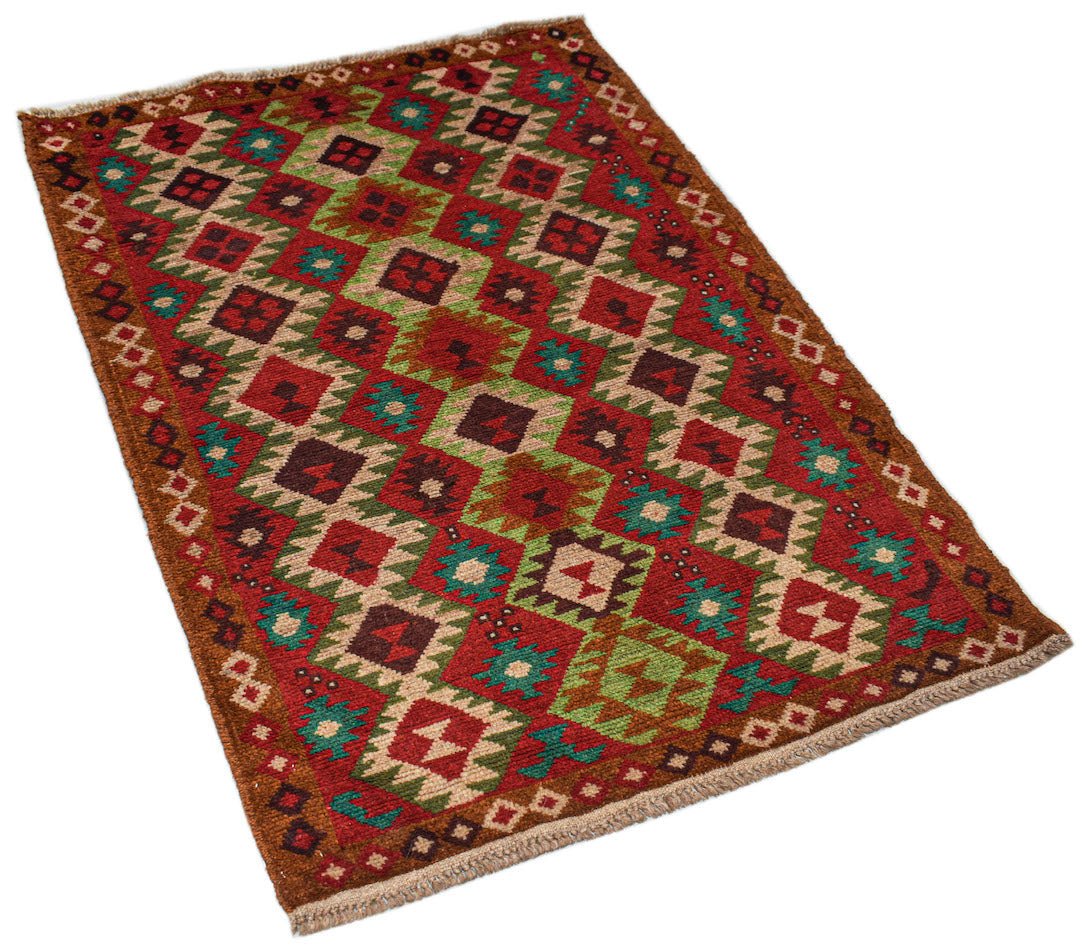 A handmade Afghan Pashm rug featuring a geometric diamond pattern in shades of red, brown, and blue.