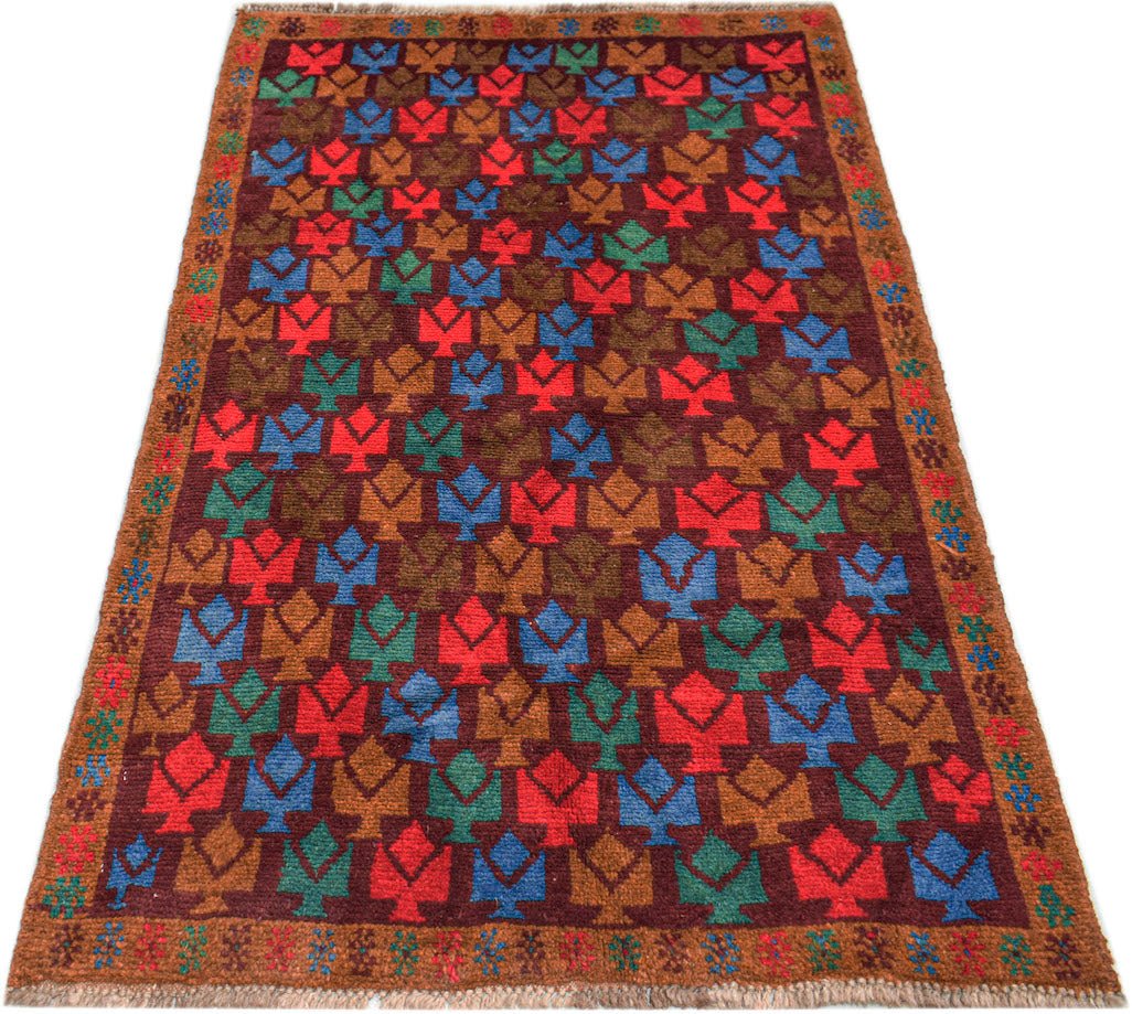 Handmade Afghan Pashm rug featuring a repeating geometric floral pattern in red, blue, and brown.