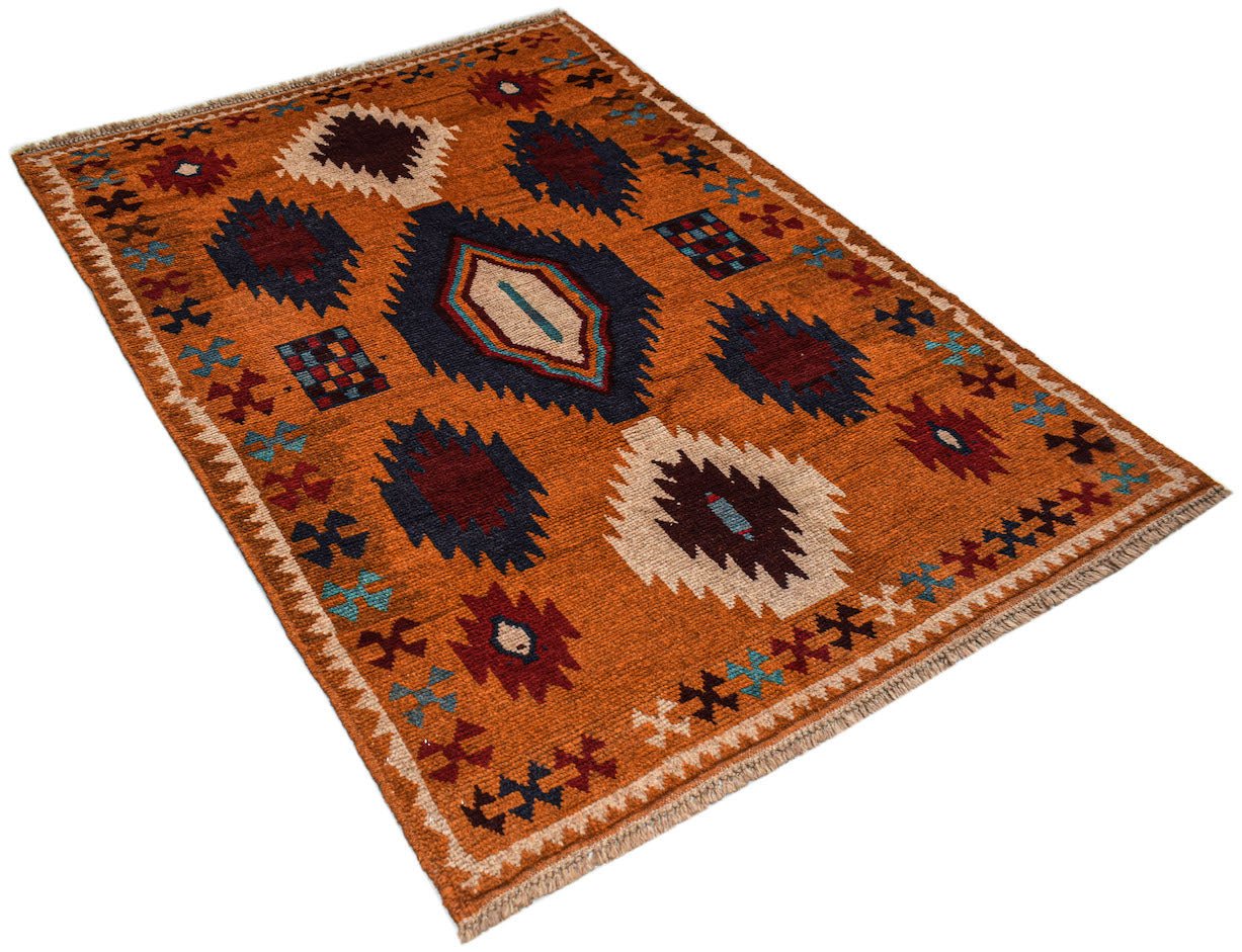Handmade Afghan Pashm rug featuring tribal geometric patterns in shades of orange, blue, and ivory.