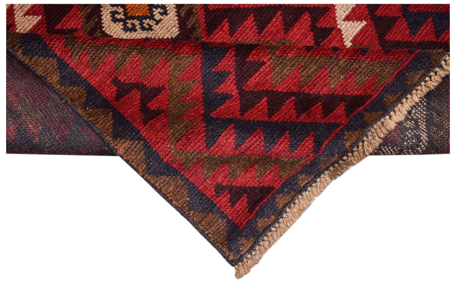 A handmade Afghan Pashm rug featuring a geometric tribal pattern in deep red, brown, and blue.