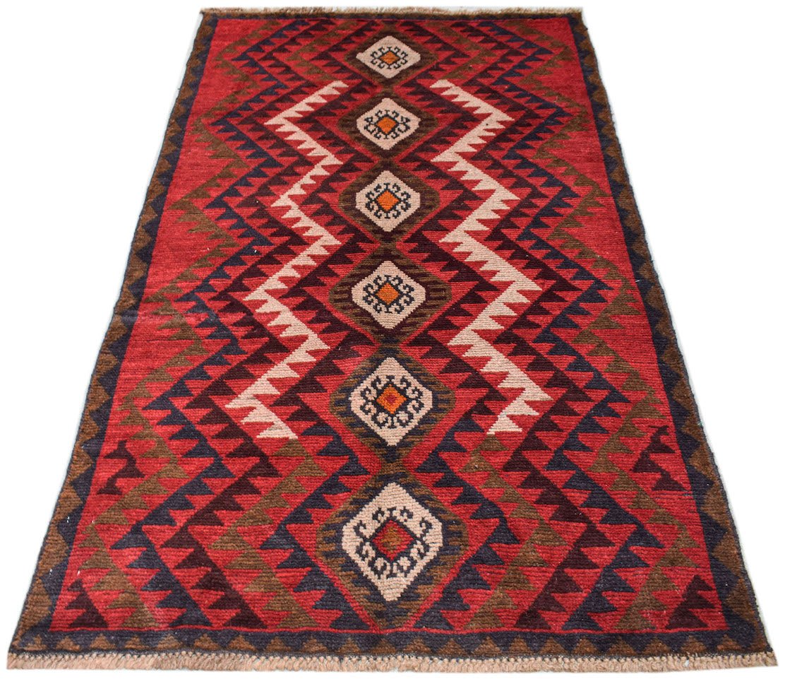 Handmade Afghan Pashm rug featuring a geometric diamond pattern in red, brown, and ivory tones.