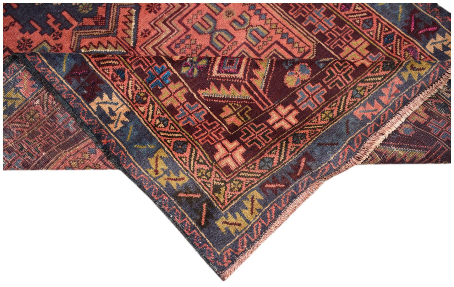 Handmade Afghan Pashm rug featuring traditional tribal geometric patterns in red, blue, and brown.
