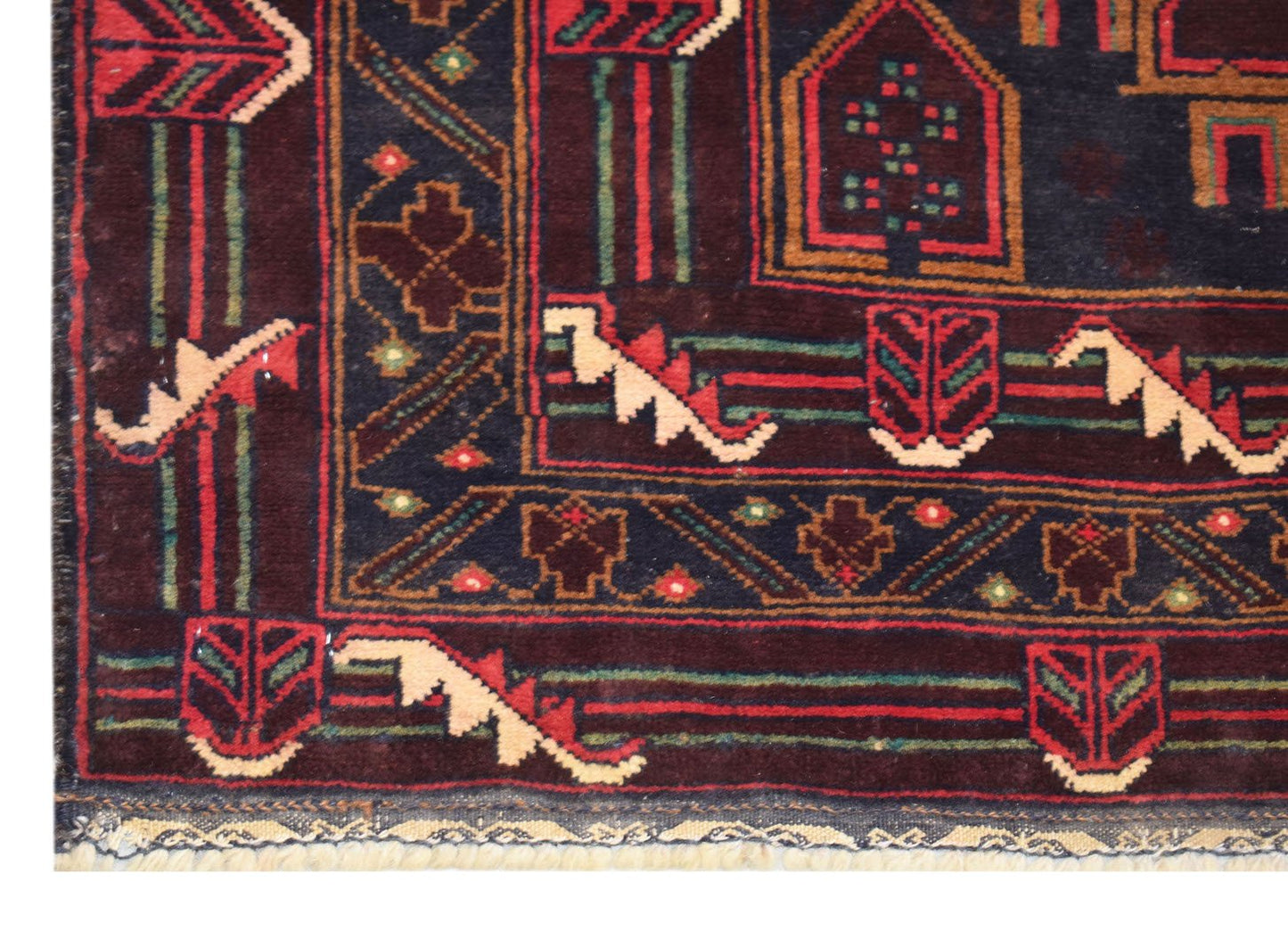 Handmade Afghan Pashm rug featuring traditional tribal geometric patterns in red, blue, and ivory.