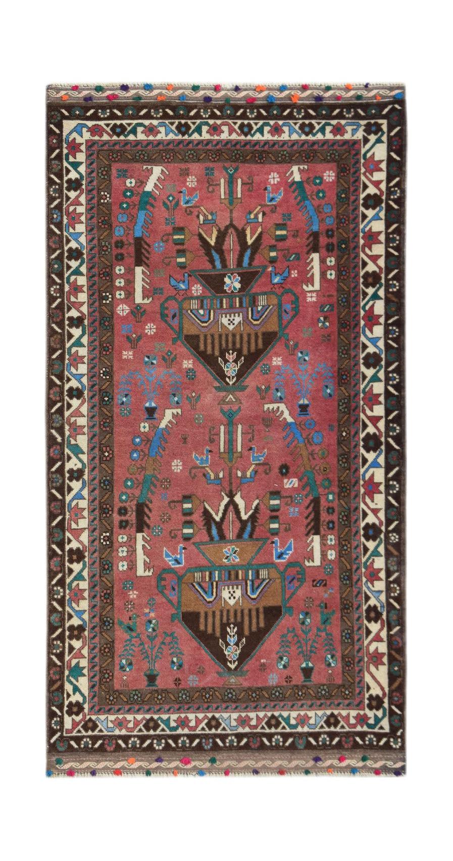 Handmade Afghan Pashm rug featuring a tribal pattern in red, brown, and blue wool.