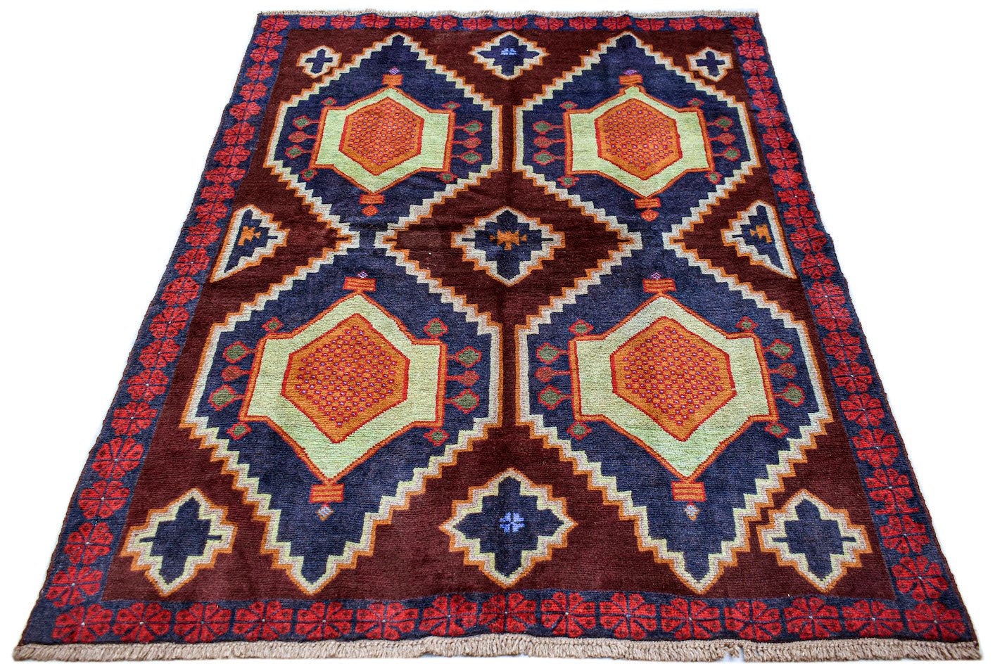 Handmade Afghan Pashm rug featuring a geometric pattern in dark red, blue, and orange wool.