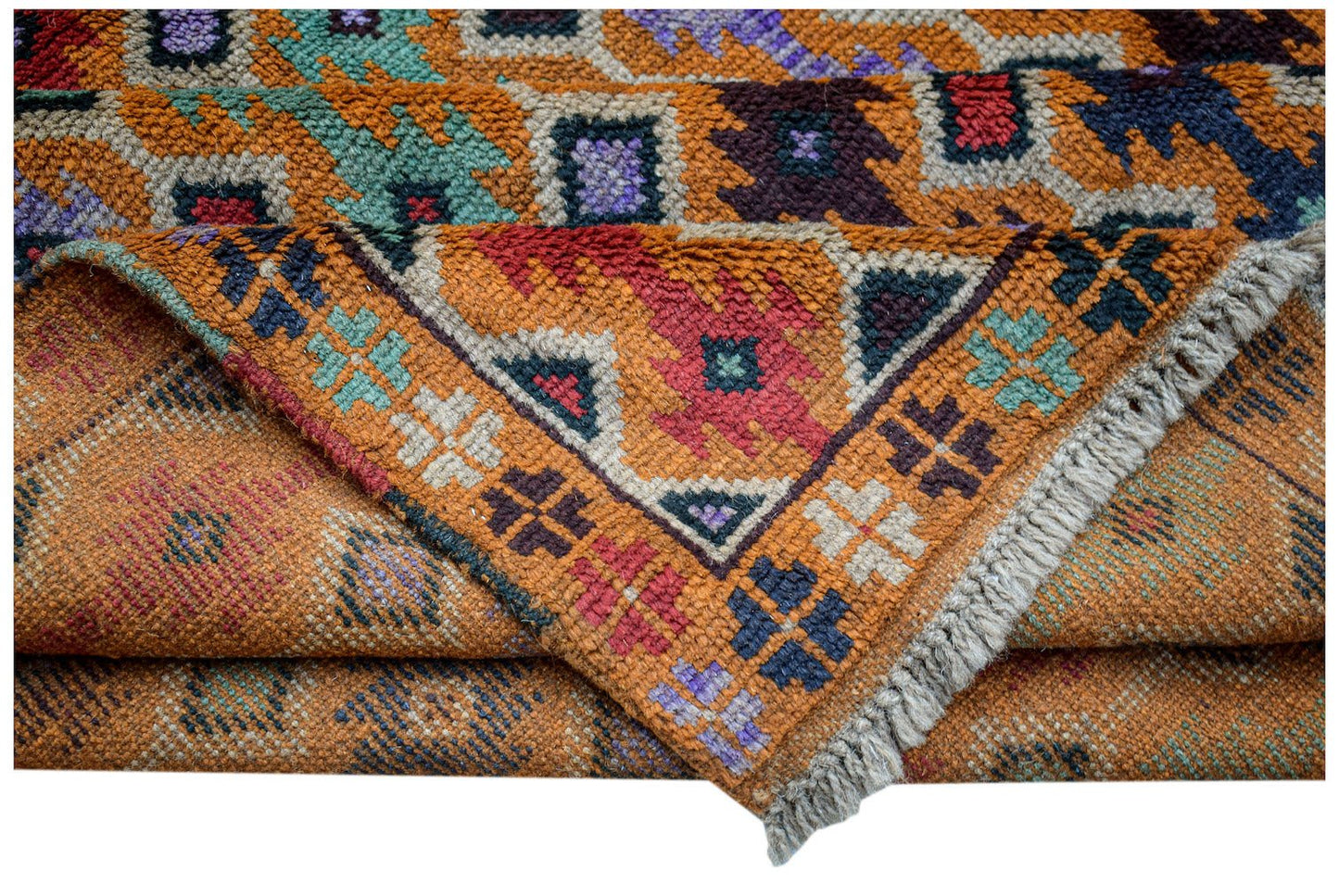 Afghan Pashm Rug with geometric patterns in orange, red, and blue.